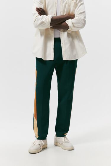 TROUSERS WITH COLOUR BLOCK STRIPES