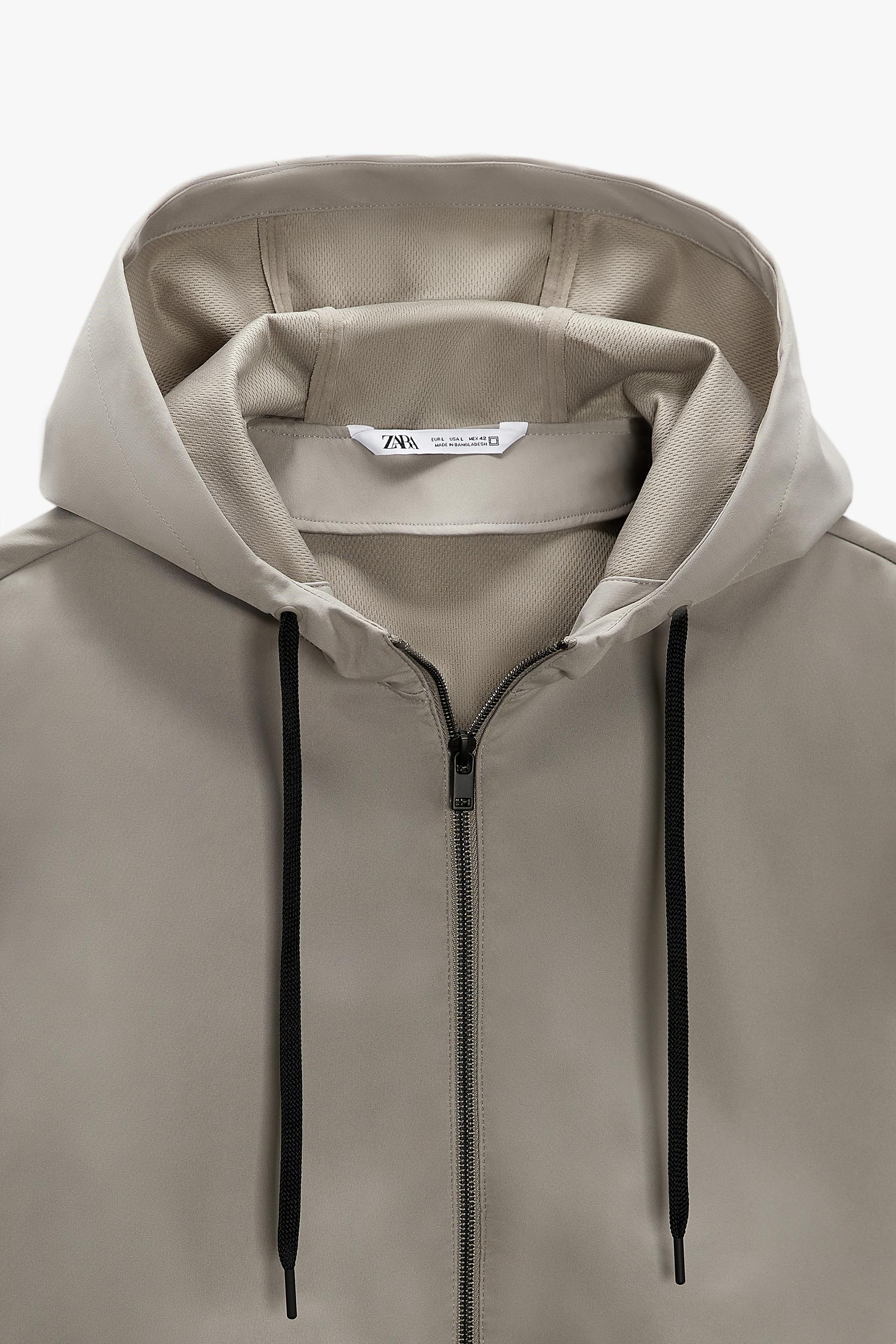 hooded technical jacket