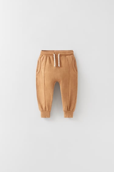 Image 0 of PLUSH TROUSERS WITH PIPING DETAILS from Zara