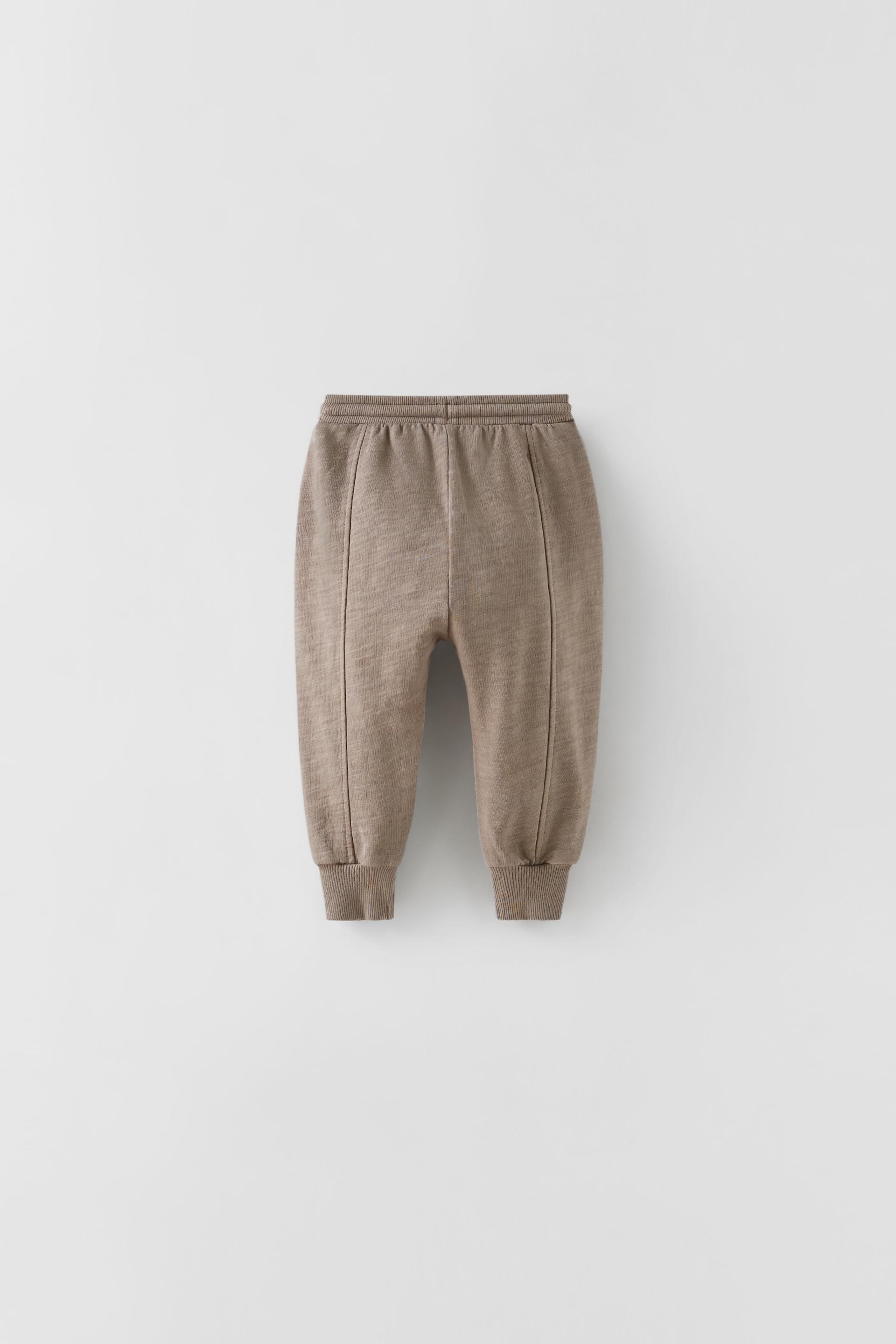 PLUSH TROUSERS WITH PIPING DETAILS 