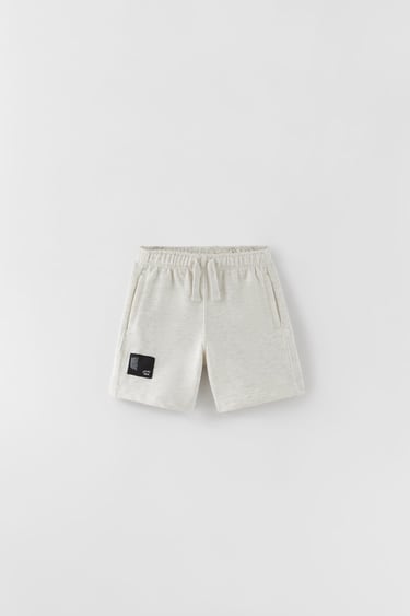 Image 0 of PLUSH BERMUDA SHORTS WITH LABEL DETAIL from Zara