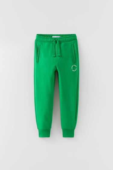 JOGGING TROUSERS WITH SLOGAN PRINT