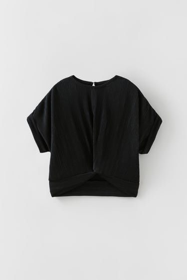 PLEATED T-SHIRT WITH A KNOT
