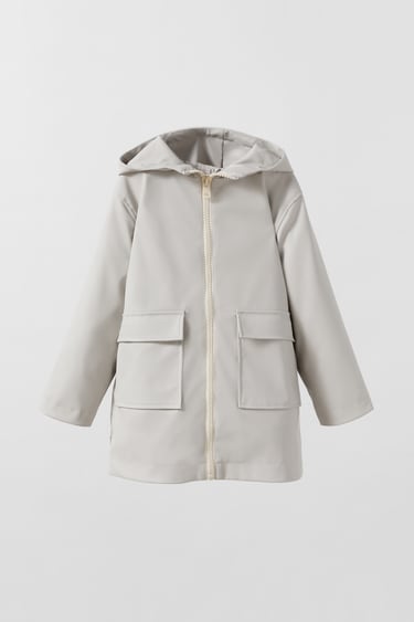 Image 0 of RUBBERISED RAINCOAT WITH SNAP BUTTONS from Zara