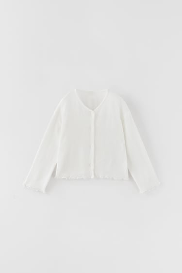 Image 0 of KNIT CARDIGAN WITH OVERLOCK from Zara