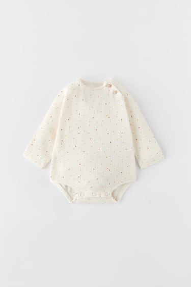 TEXTURED SPOTTED BODYSUIT