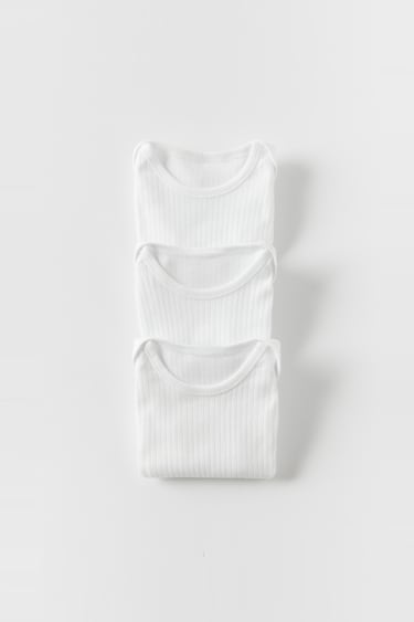 Image 0 of BABY/ 3-PACK OF SLEEVELESS ROUND NECK BODYSUITS from Zara