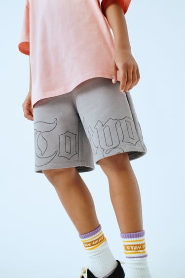 PLUSH BERMUDA SHORTS WITH LETTERING