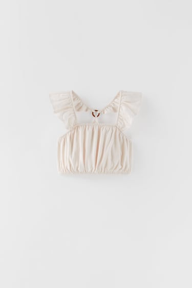 EMBELLISHED TOP WITH RUFFLES