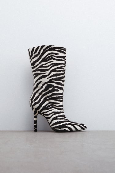 ANIMAL PRINT HEELED LEATHER ANKLE BOOTS