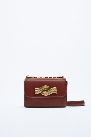 Imagine 0 din GEANTA CU BANDULIERA SI DETALIU METALIC de pe Zara