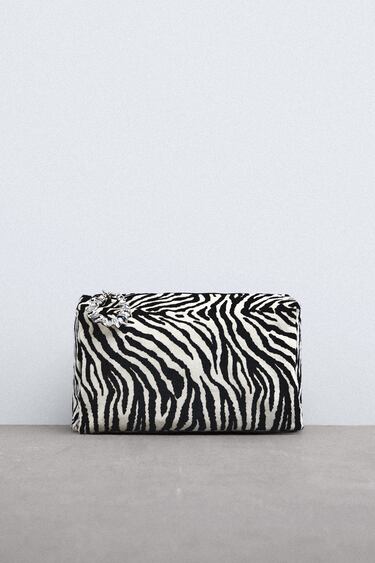 LEATHER CLUTCH WITH ANIMAL PRINT