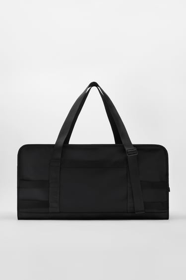 RUBBERISED BOWLING-STYLE TRAVEL BAG