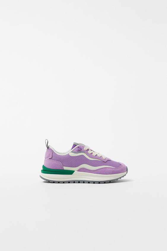 purple running trainers