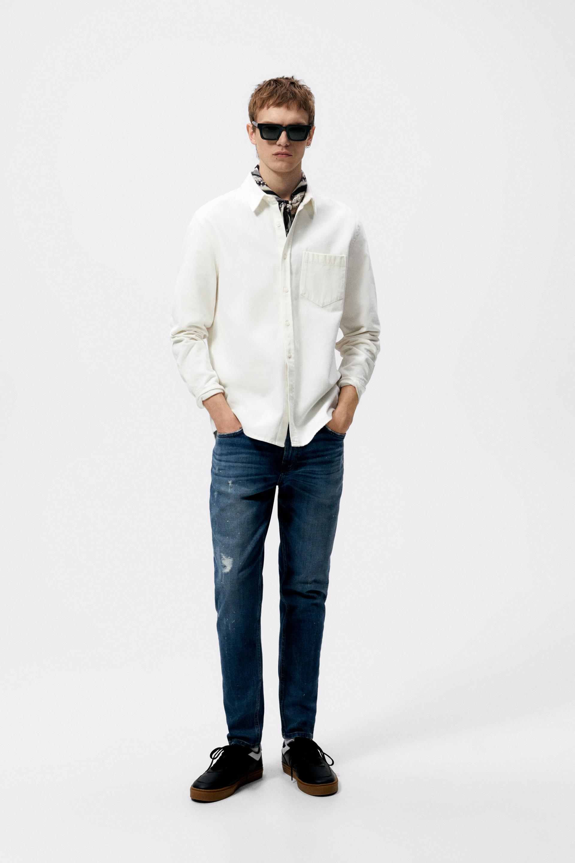RIPPED JEANS WITH PAINT SPLATTER - Blue 
