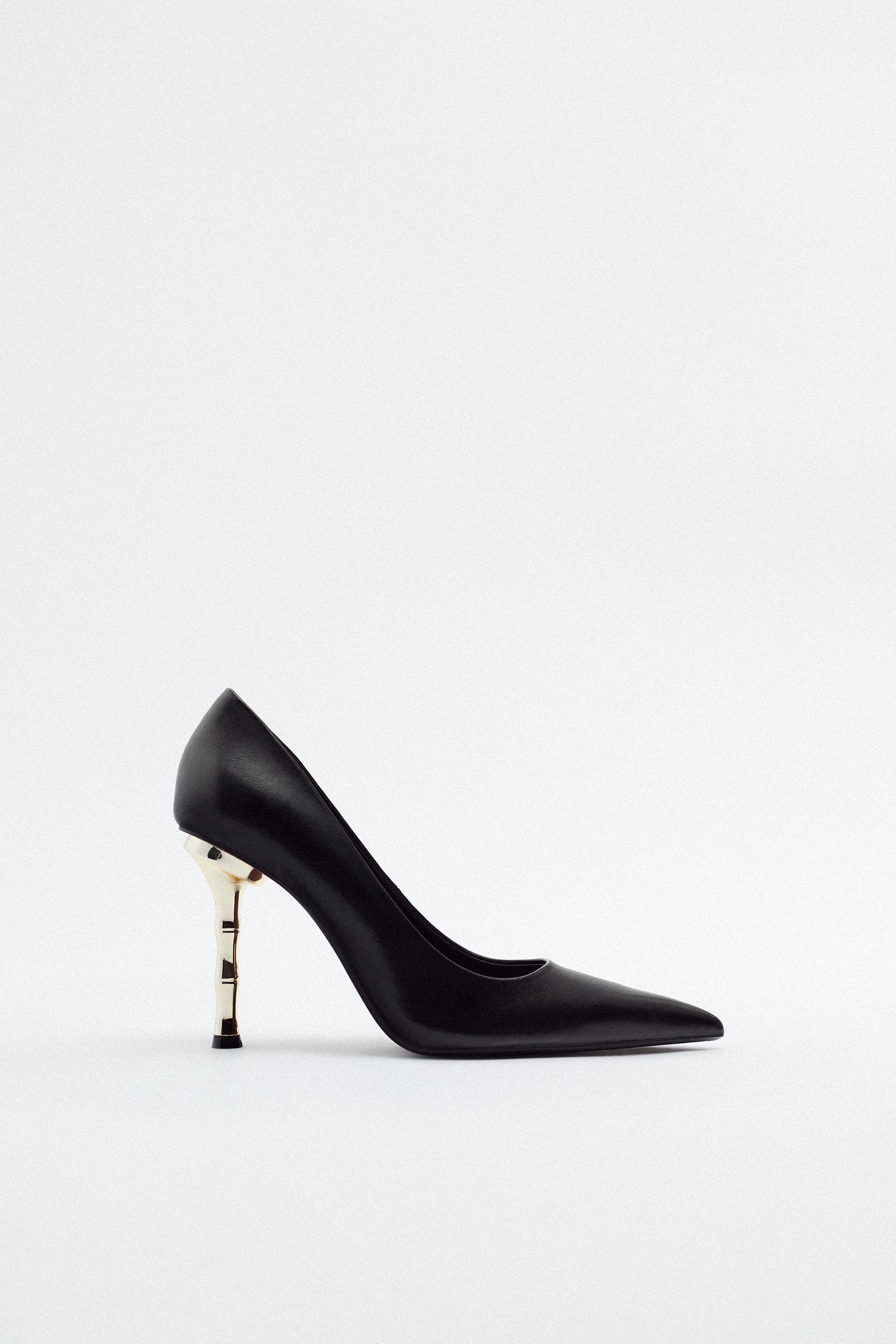 Black leather pointed heels