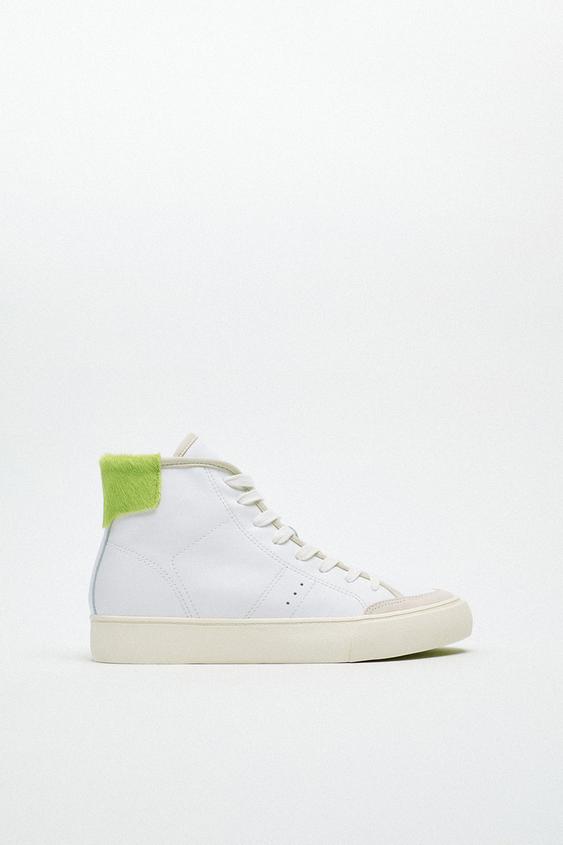 white mid top trainers