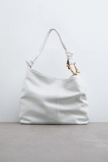 LEATHER TOTE BAG WITH METALLIC DETAIL