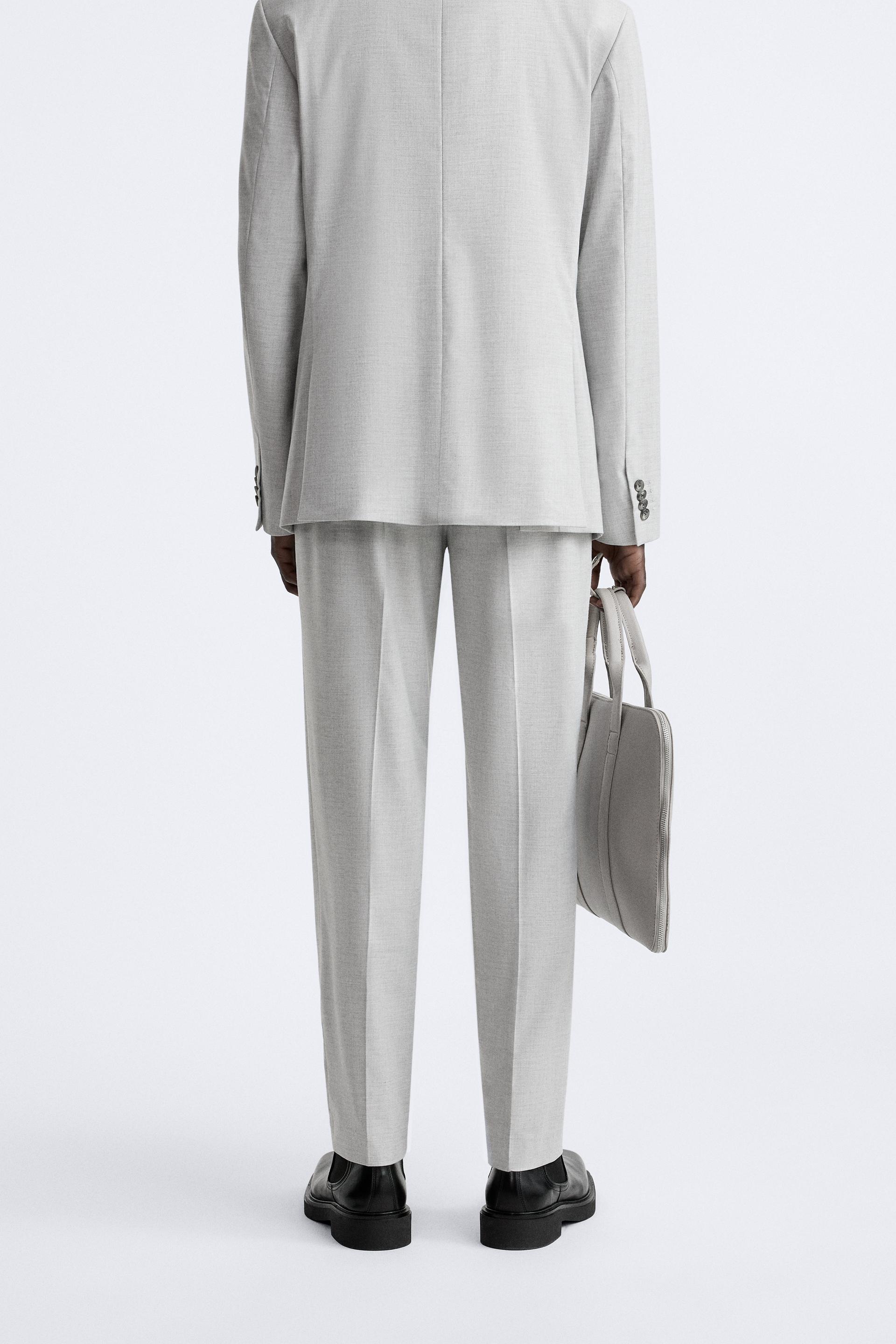 Traje gris 2024 hombre zara