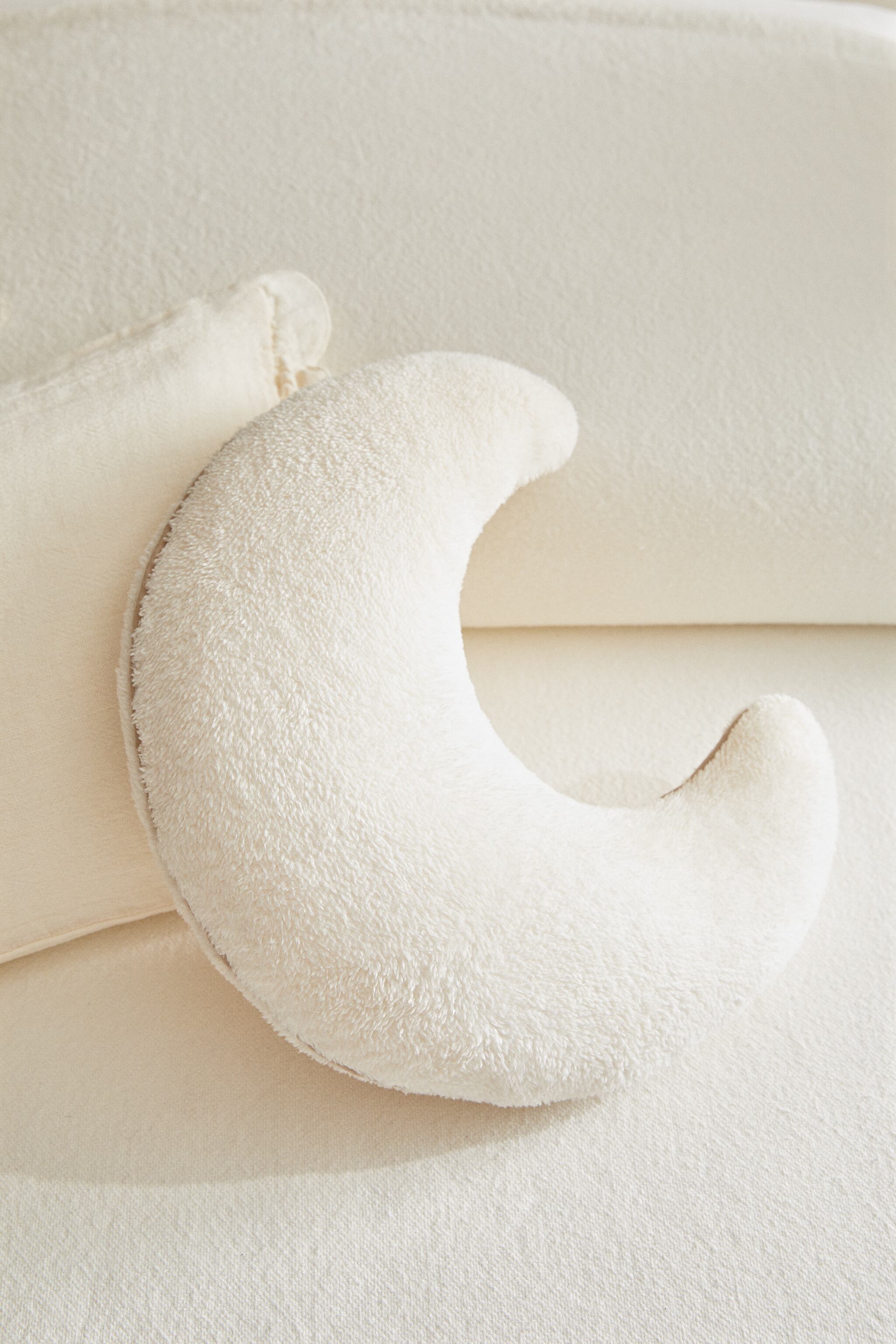 MOON-SHAPED THROW PILLOW