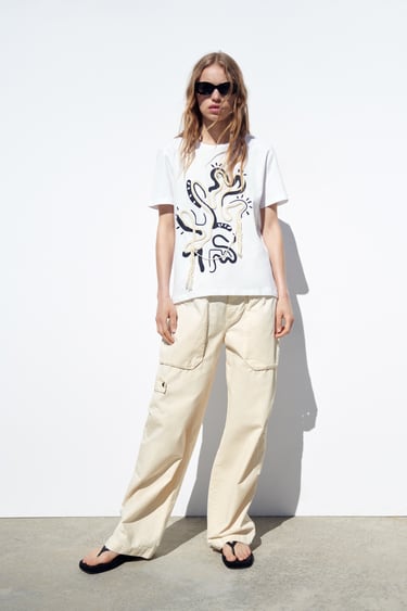 Image 0 of T-SHIRT WITH DRAWSTRING AND FRINGING from Zara