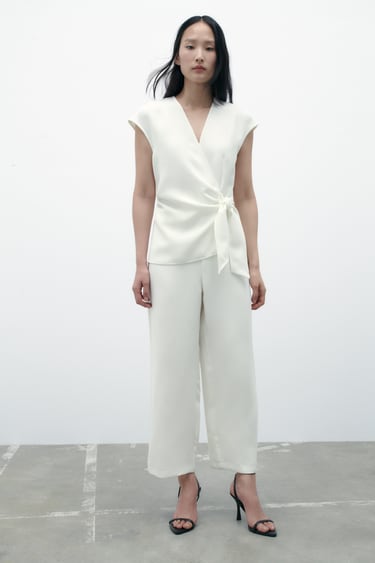 Image 0 of CROSSOVER JUMPSUIT WITH KNOT from Zara