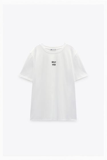 Image 0 of T-shirt made of cotton. Round neck and short sleeves. Contrasting text at front. from Zara