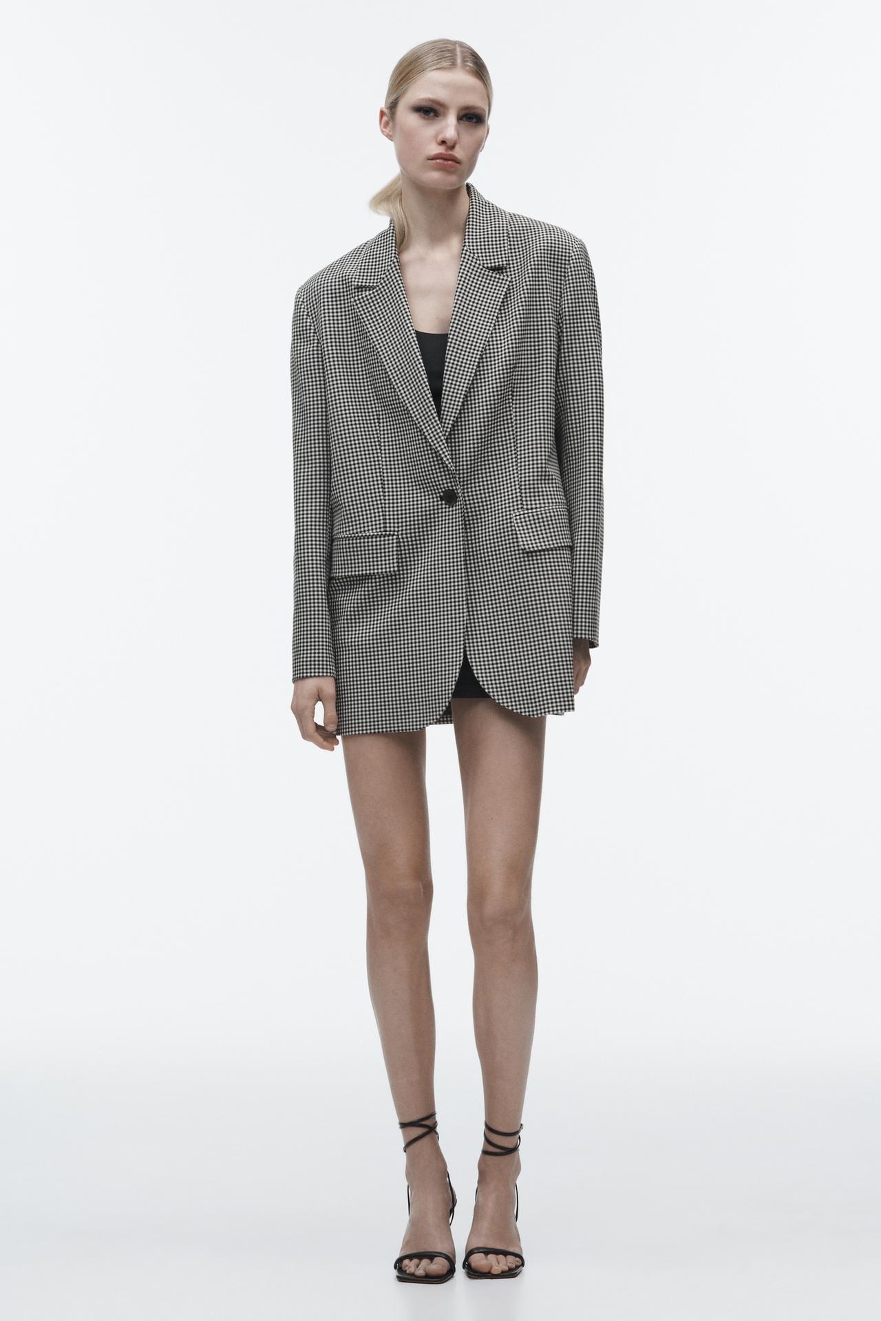 Zara Straight check blazer with a lapel collar and long sleeves. Front pockets with flaps. Matching lining. Button fastening at the front.