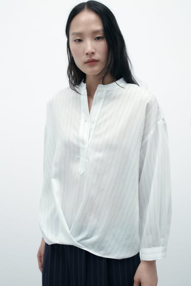 Image 0 of FRONT KNOT STRIPED BLOUSE from Zara