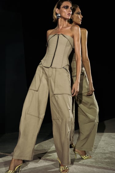 Image 0 of TROUSERS WITH ZIPS AND TOPSTITCHING from Zara