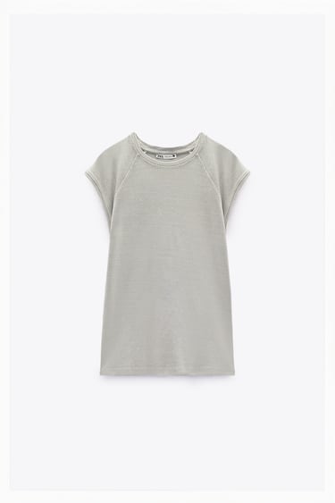 Image 0 of T-shirt made of cotton. Round neck and short sleeves. Washed effect. from Zara