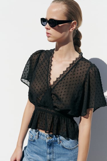 Image 0 of DOTTED MESH WRAP BLOUSE from Zara