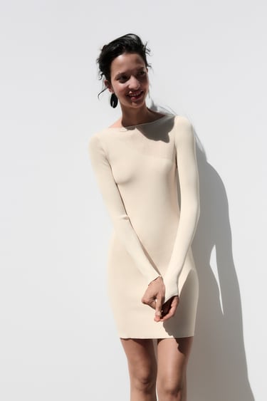 Image 0 of SHORT CONTRAST KNIT DRESS from Zara