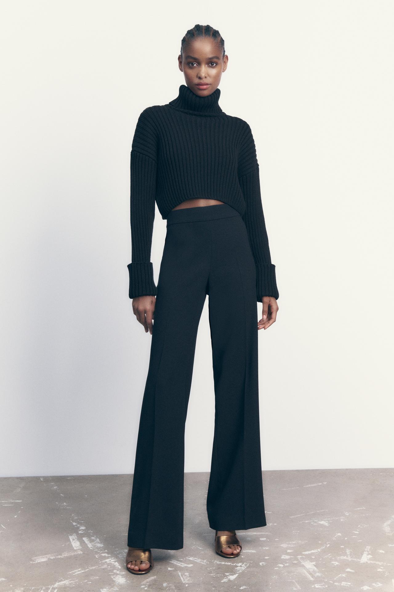 Zara loose-fitting high-waist trousers with a straight-leg design. Invisible side zip fastening. These staple trousers come in black.