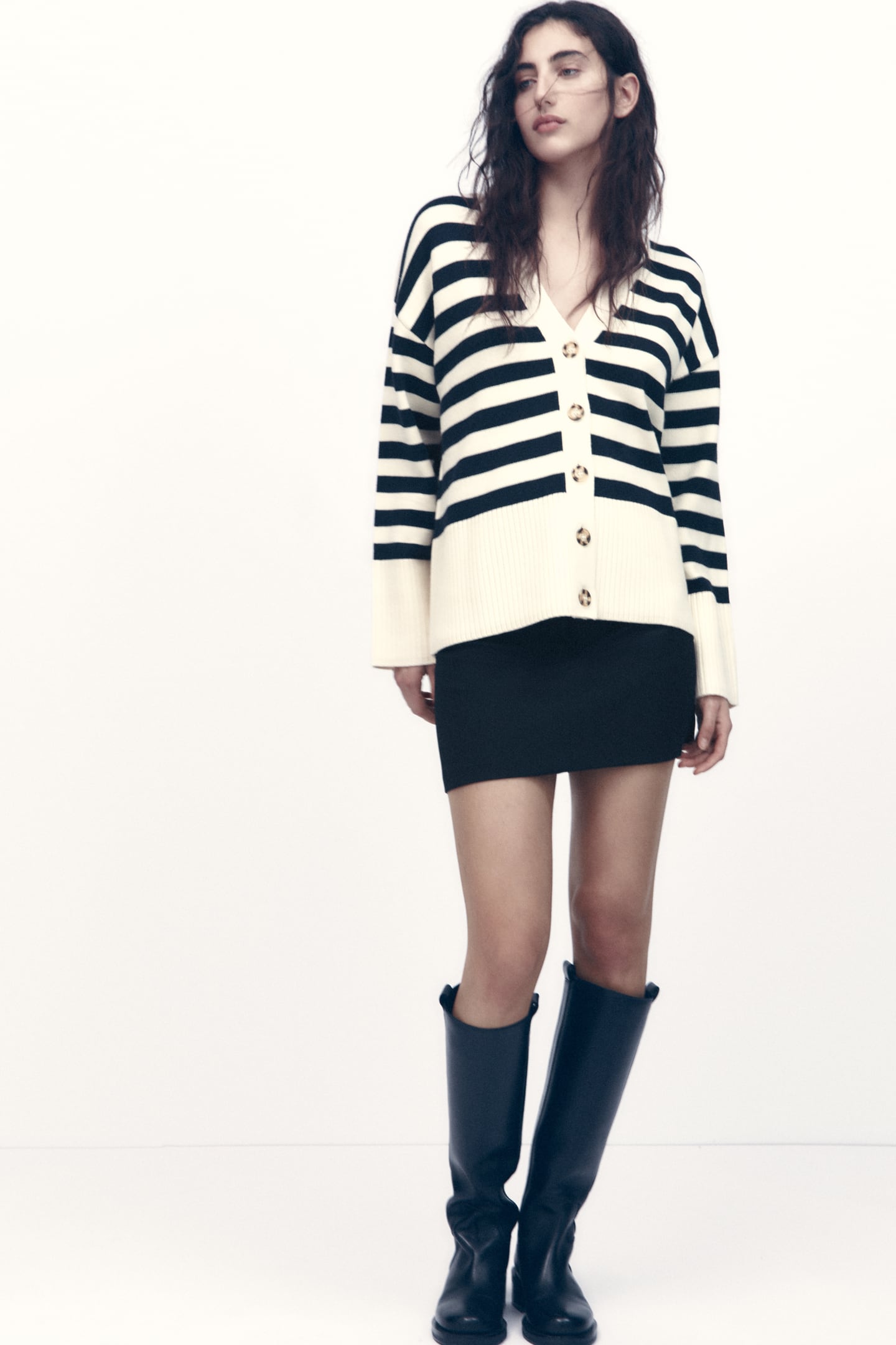 model wearing a striped cardigan from Zara