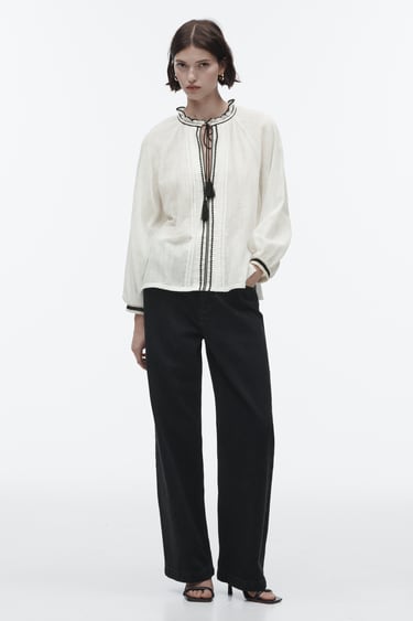 Image 0 of EMBROIDERED BLOUSE WITH TUCKS from Zara