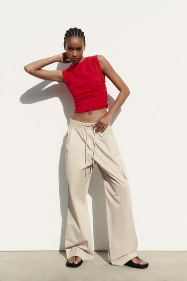 zara trousers with buttons