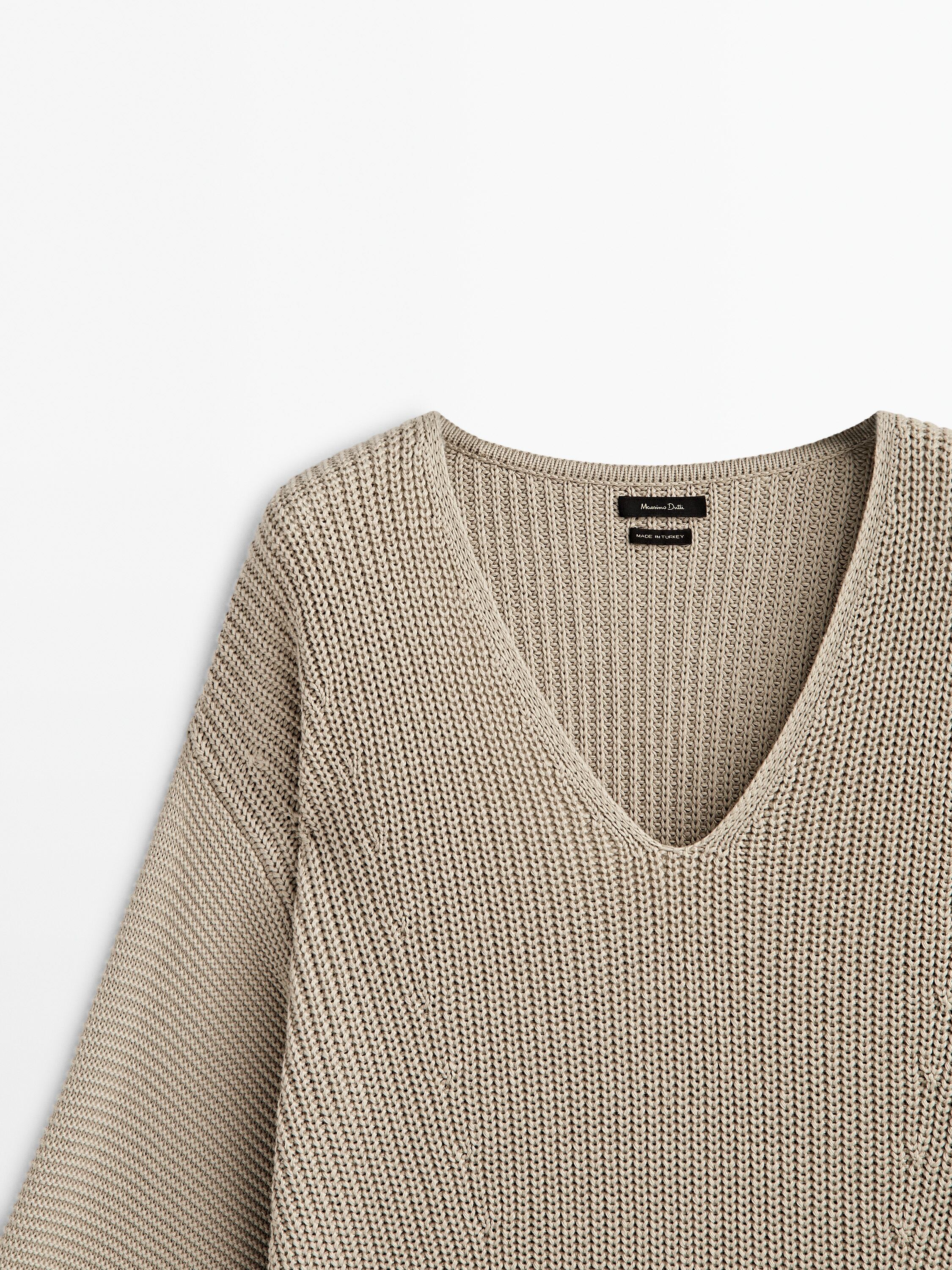 Purl knit sweater with sleeve detail