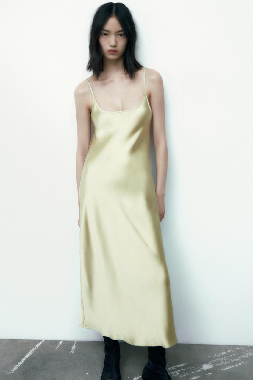 Zara Midi satin slip dress in a light green / yellow shade with a wide neckline and adjustable thin straps.