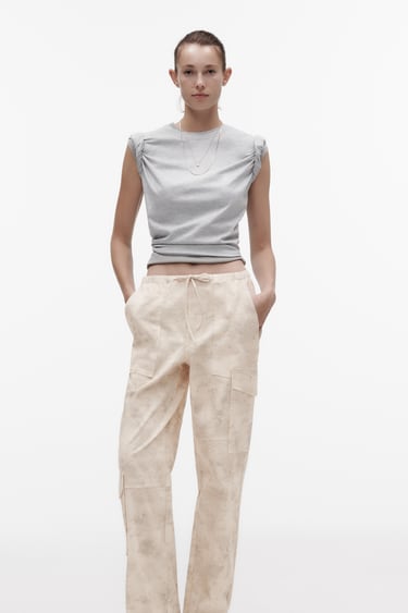 Image 0 of PRINTED CARGO TROUSERS from Zara