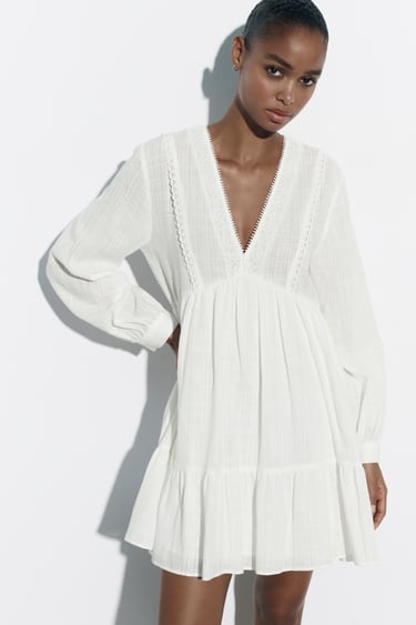 Image 0 of VOLUMINOUS MINI DRESS from Zara