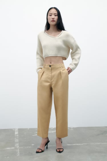 Image 0 of HIGH-WAIST CARROT FIT DARTED TROUSERS from Zara