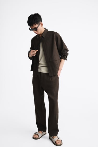 Image 0 of LINEN AND COTTON PLEATED TROUSERS from Zara