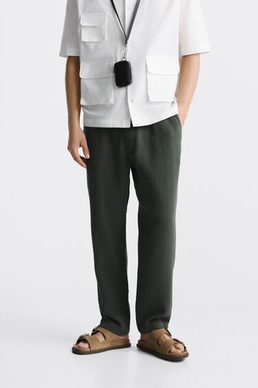 Image 0 of LINEN-EFFECT TROUSERS from Zara