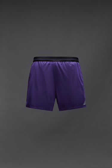 Image 0 of PERFORATED TRAINING SHORTS from Zara