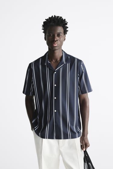 Image 0 of STRIPED ELASTIC SHIRT from Zara