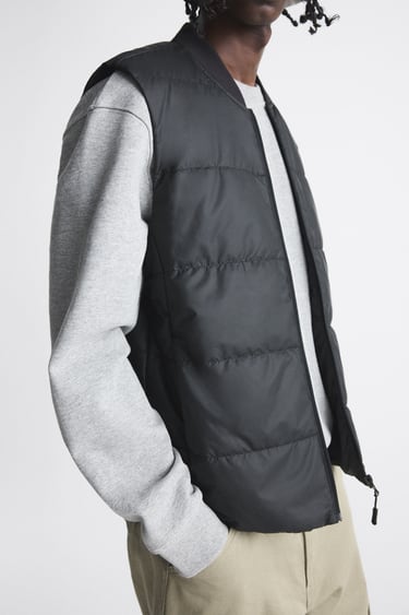 Image 0 of GILET WITH RUBBERISED FINISH from Zara