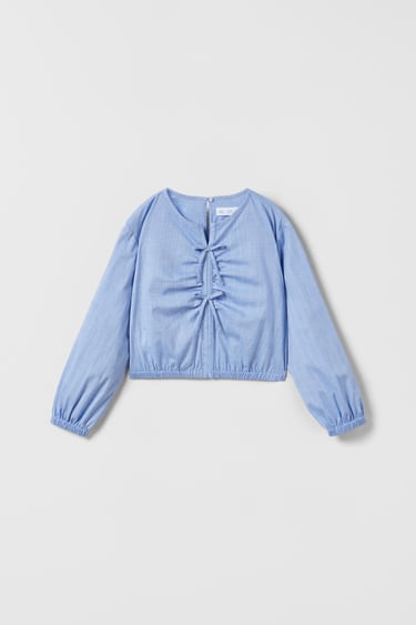 Image 0 of PINSTRIPE BLOUSE WITH BOWS from Zara