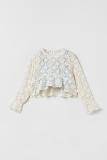 Image 0 of CONTRASTING FLORAL BLOUSE TOP from Zara