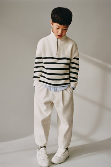 Image 0 of ZIPPED SWEATER WITH STRIPES from Zara